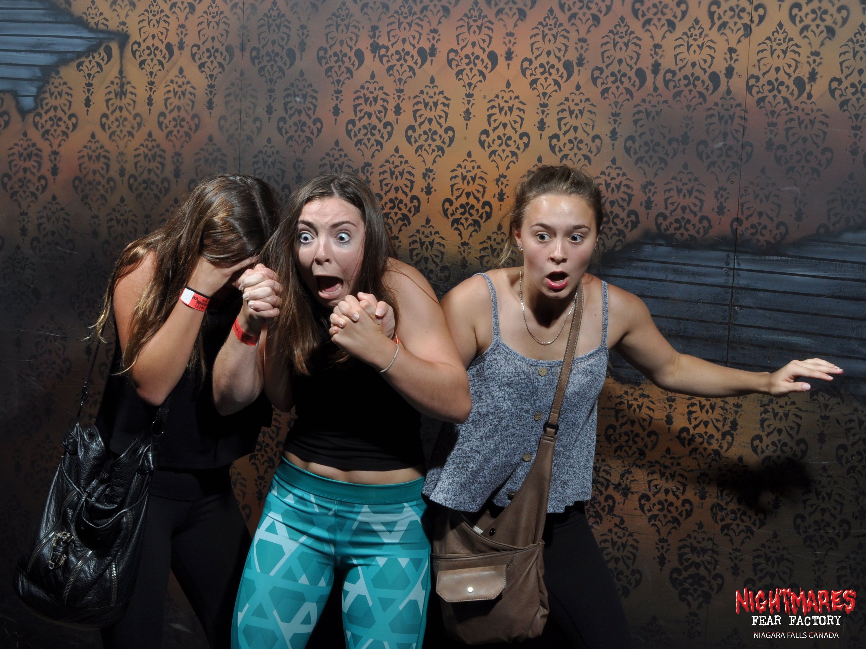 scared people in haunted house