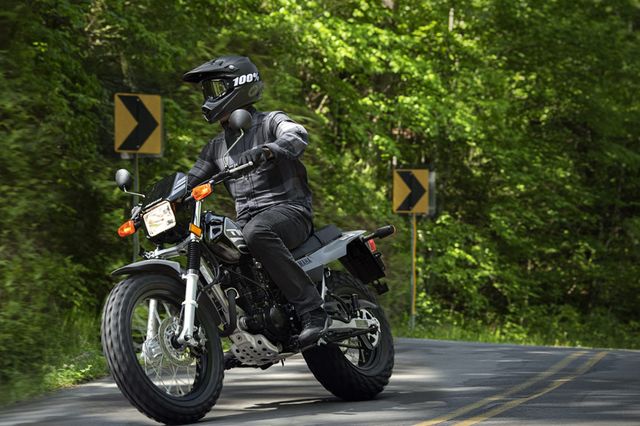 person riding yamaha mt 03 motorcycle