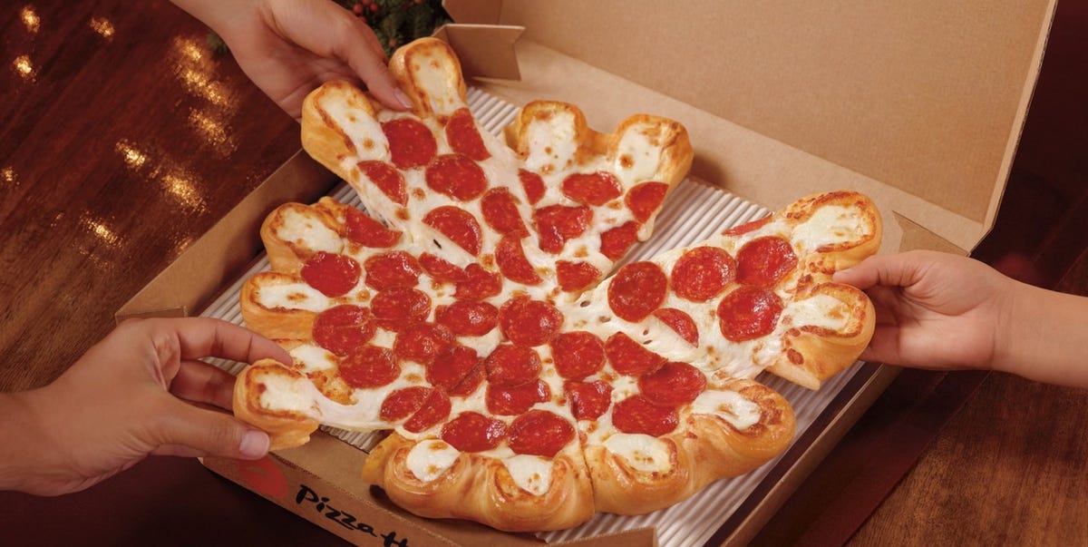 This New Pizza Hut Pizza Features "Cheese Pockets," Because Literally Pockets Are Always a Good Thing