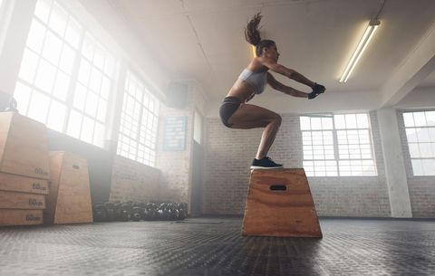 woman doing a box jump