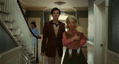 the eyes of tammy faye andrew garfield as "jim bakker" and jessica chastain as "tammy faye bakker" in the film the eyes of tammy faye photo courtesy of searchlight pictures © 2021 20th century studios all rights reserved