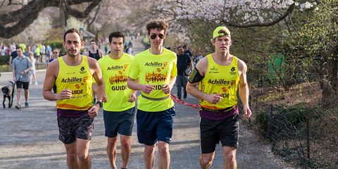 Charles Catherine (middle) and Andrew Tonner (right) train with Matt Leibman 33, (left) and Matt Karr, 34, (middle, back), both of whom guided Charles in the 2016 Boston Marathon.