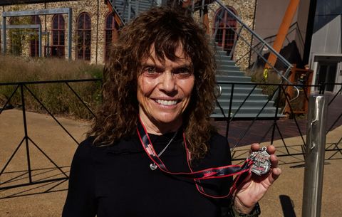Margaret Chain with her Runner's World 10K medal.