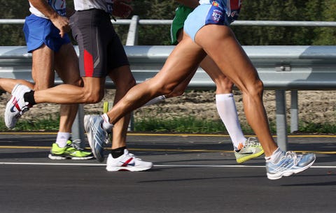 5 post race standing stretches every runner should do runner s world