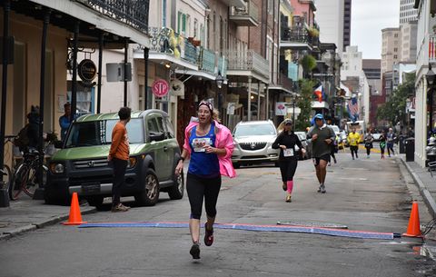 Runner crossing the finish line
