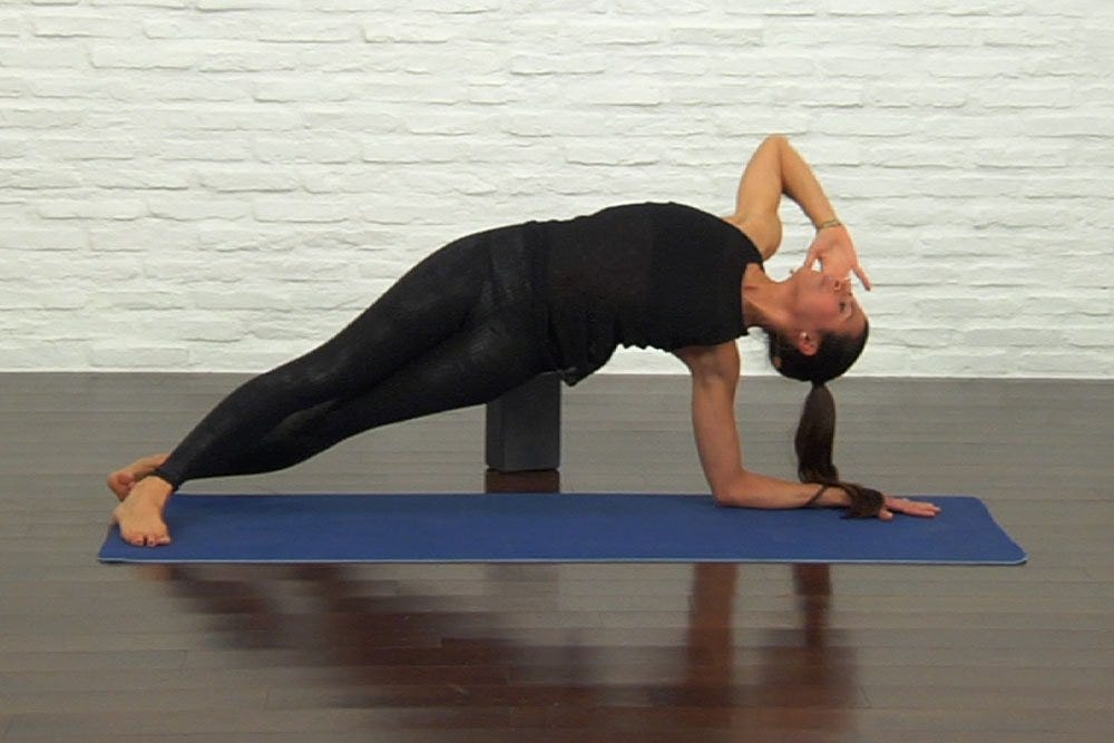 Class 9: Core Yoga | Runner's World