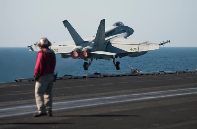 Heavy Winds Blew an F/A-18 Super Hornet Right Off the Side of an ...