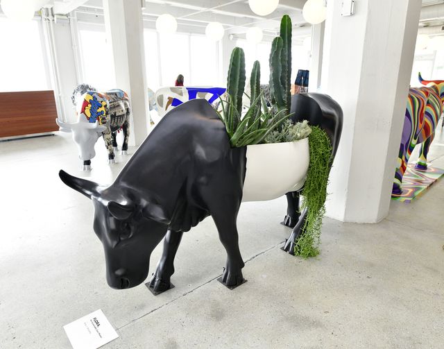brooklyn, new york   august 05 flora, the sustainable cow planter cow painted by brian j mccarthy on display at the cowparade 2021 launch event hosted by god’s love we deliver at the artist studio sponsored by clear in industry city on august 5, 2021 in brooklyn, ny photo by eugene gologurskygetty images for gods love we deliver