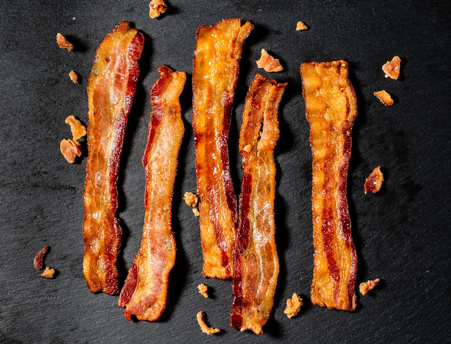butcher box bacon on a black slate