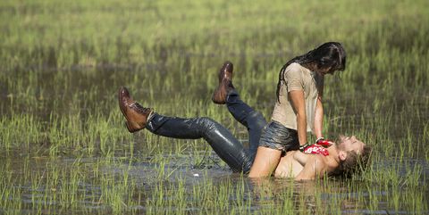 Human body, Jeans, Grassland, Plain, People in nature, Field, Boot, Youth, Grass family, Thigh, 