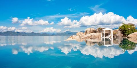 Body of water, Sky, Cloud, Water, Water resources, Reflection, Coastal and oceanic landforms, Cumulus, Azure, Lake, 