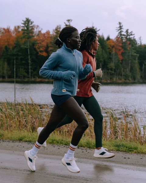 people wearing tracksmith eliot runner sneaker while jogging