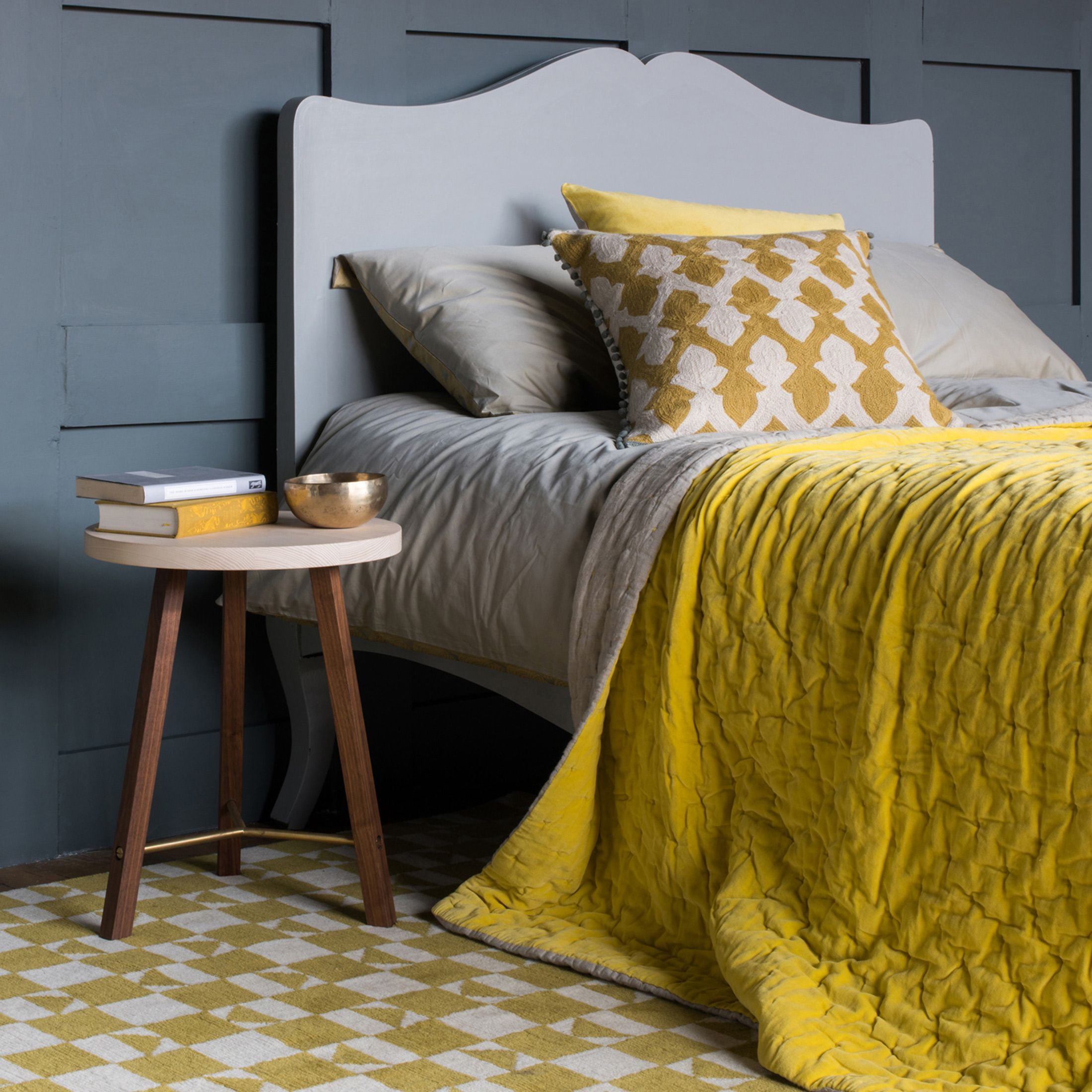 Yellow and grey color scheme for bedroom