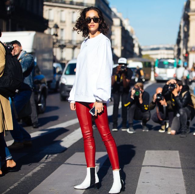 woman wearing faux leather leggings streetwear