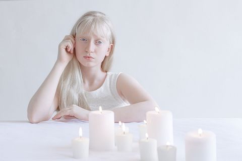 Hairstyle, Eyelash, Beauty, Blond, Candle, Flash photography, Photography, Wax, Peach, Portrait photography, 