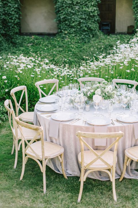 Chair, Furniture, Table, Tablecloth, Wedding reception, Folding chair, Outdoor table, Textile, Backyard, Grass, 