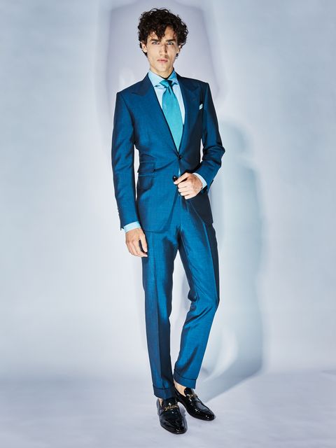 Suit, Clothing, Blue, Formal wear, Fashion model, Fashion, Tuxedo, Electric blue, Outerwear, Standing, 