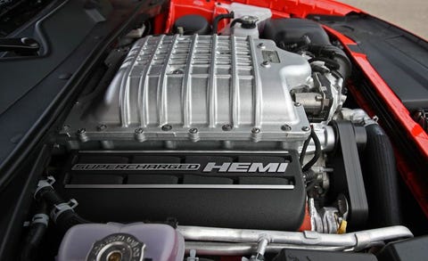 Supercharger Vs Turbocharger Which Engine Booster Is Best A Supercharger Sits Atop The Dodge Challenger Hellcat S V 8 It Driven Off Of Crankshaft By Wide Black Belt At Front Engine