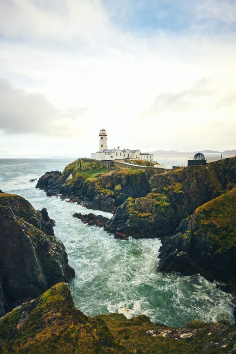 Body of water, Water, Sea, Coast, Sky, Wave, Ocean, Shore, Lighthouse, Headland, 