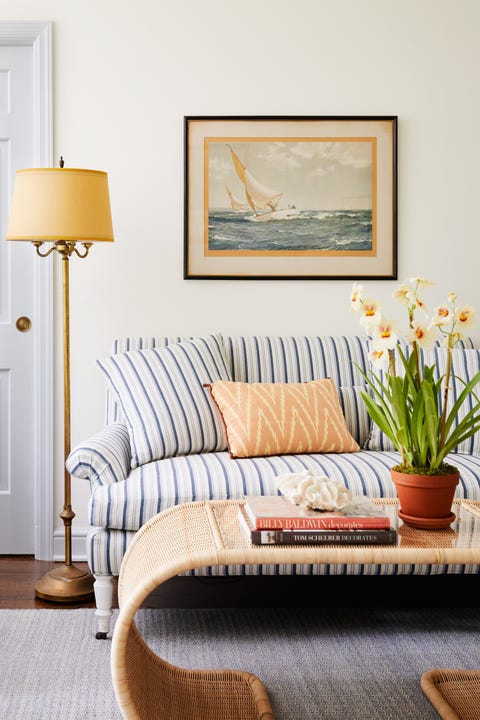 whicker coffee table, blue and white striped couch