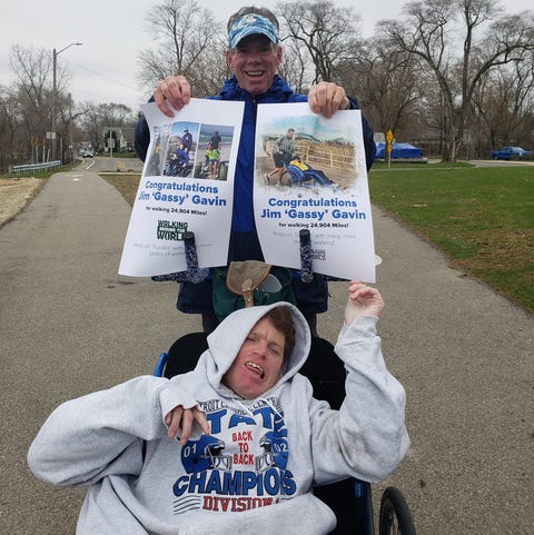 jim gavin and his son jimmy gavin after finishing the walk that completed the total distance around the world