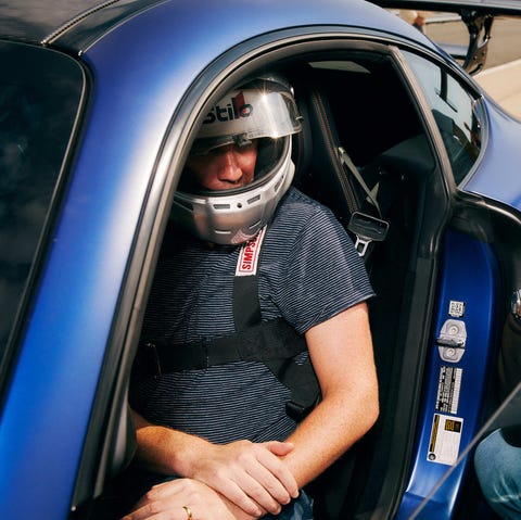 simpson hybrid s FIA hnr hnr head neck restraint on racetrack