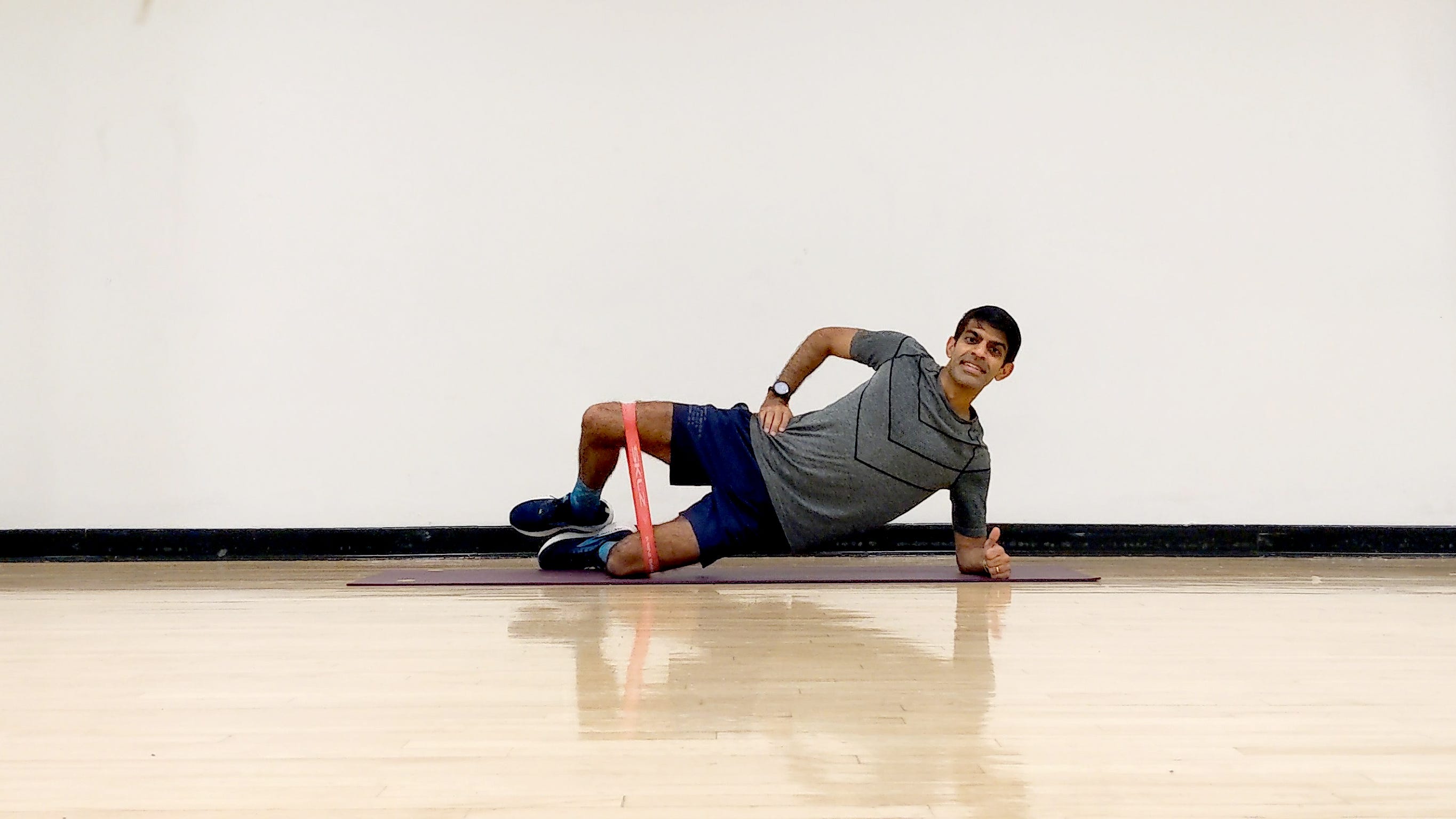 Prime Your Backside for Hill Sprints and Speed Drills with This Glute Band Workout