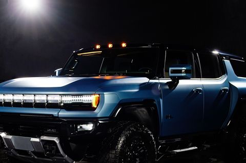 2024 gmc hummer ev omega edition suv featuring exclusive neptune blue matte exterior color and blacked out accents