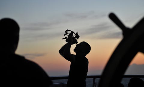 senior chief petty officer mike rosati uses a sextant while conducting celestial navigation training while sailing on the atlantic ocean aboard the coast guard cutter eagle, aug 3, 2015 celestial navigation is taught to the coast guard academy cadets while they spend time underway on the eagle us coast guard photo by petty officer 2nd class matthew s masaschi