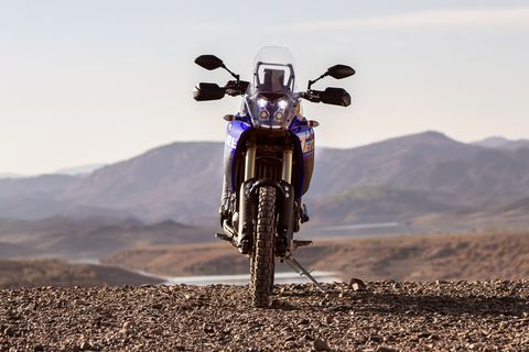 front shot of yamaha tenere 700 motorcycle with mountains in the background