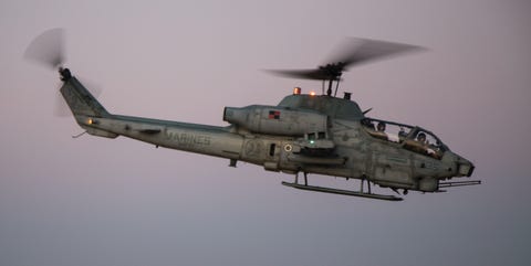 attack helicopter lands in field to retrieve lost cell phone