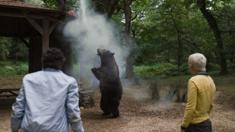 from left, back to camera eddie alden ehrenreich and stache aaron holliday in cocaine bear, directed by elizabeth banks