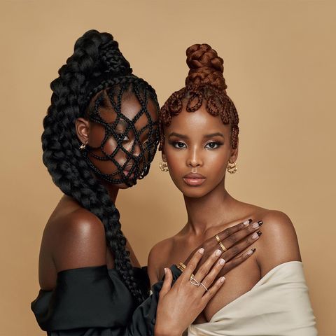 two models wear omi woods jewelry in a roundup of black owned jewelry brands