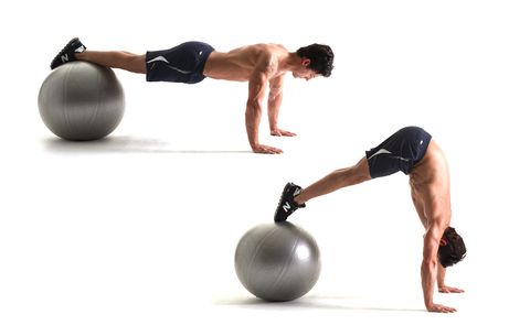Model performing swiss ball pikes 