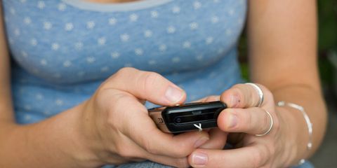 skin cancer apps aren't effective or reliable; woman with smartphone