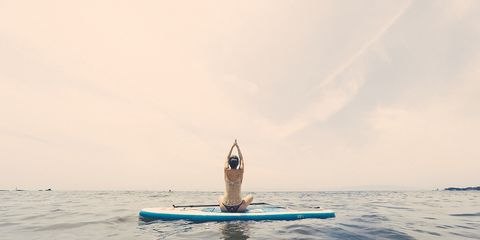 Yoga On A Stand-Up Paddleboard