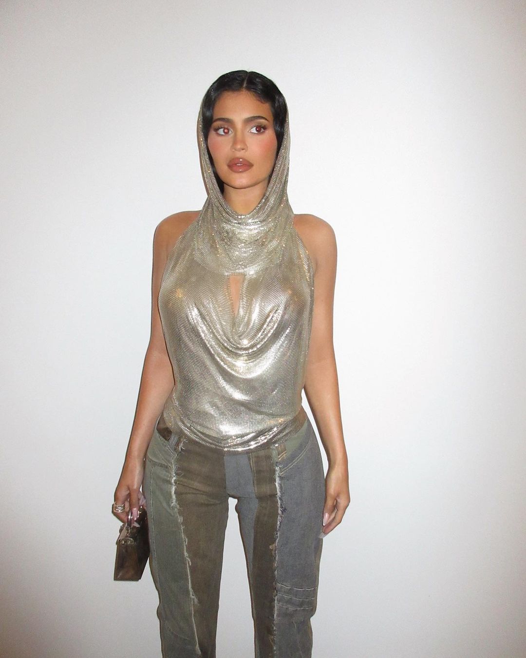 Kylie Jenner’s Dazzling Party Look Involves a Hooded Top and Unexpected Pants