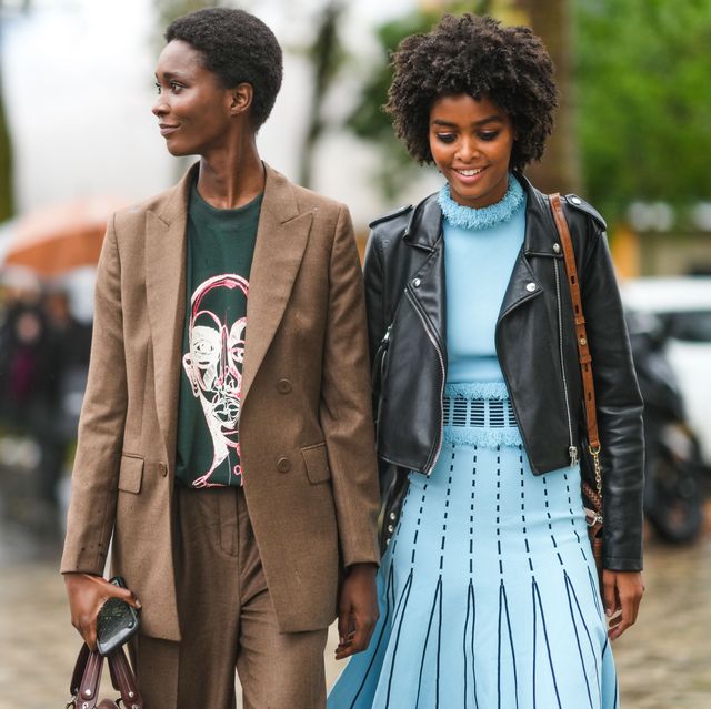 two women walking outside during paris fashion week 2022