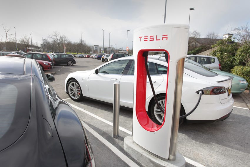 Musk Dismisses Twitter Angst as Tesla Reports Record Sales and Income