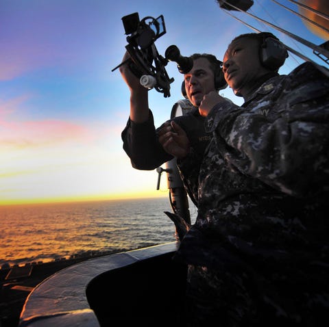 senior chief petty officer jonathan myers teaches command master chief april beldo how to use a marine sextant during a demonstration of celestial navigation aboard the aircraft carrier uss carl vinson carl vinson is on a three week composite training unit exercise to be followed by a deployment to the western pacific ocean