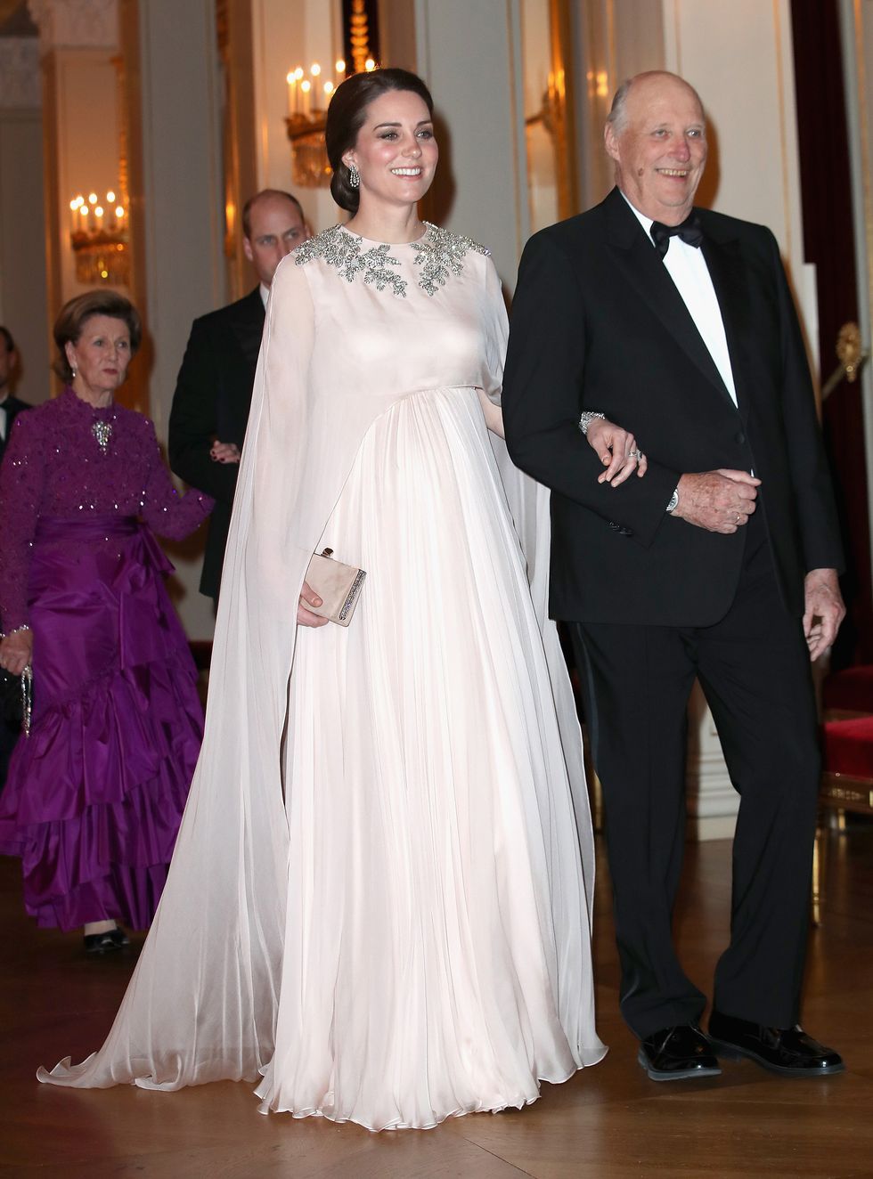 38-escorted-into-dinner-by-king-harald-v-of-norway-at-the-royal-palace-on-day-3-of-her-visit-to-sweden-and-norway-with-prince-william-duke-of-cambridge-on-february-1-2018-in-oslo-norway-1523224530.jpg