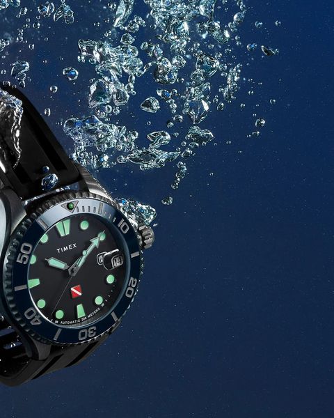 a timex tiburon automatic 44mm synthetic rubber strap watch in the water