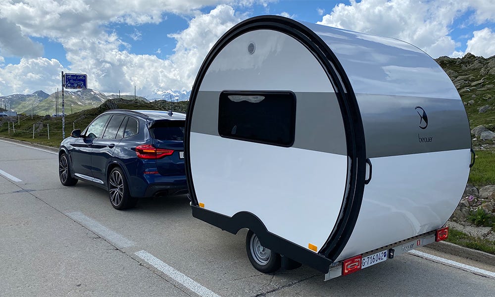 This luxury mini-camper becomes as big as an apartment, and costs as much as a moped