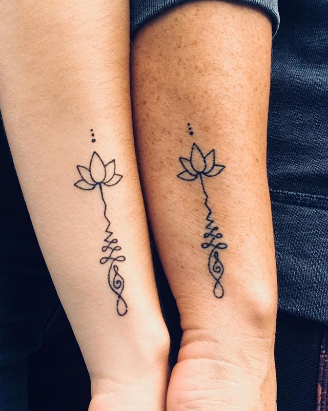 Matching mom and daughter tattoos