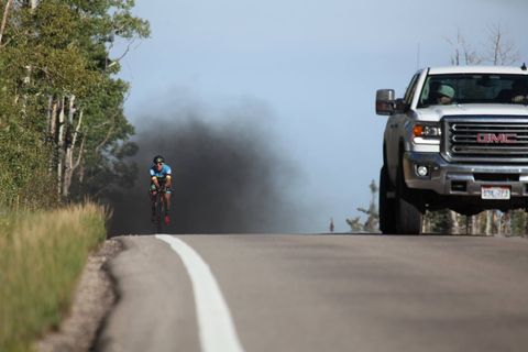 Truck rolls coal on cyclist