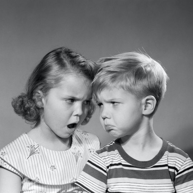 1950s boy girl head to head angry facial expressions argument fight