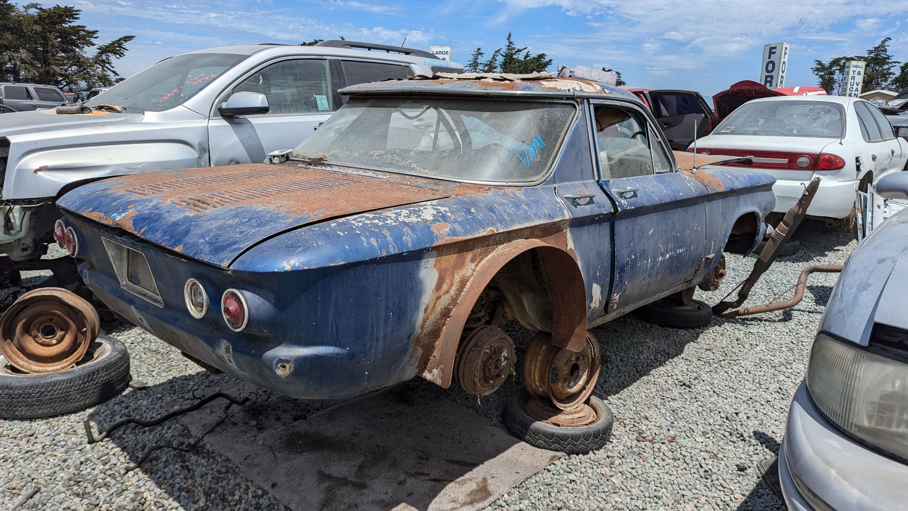 Shorty Chevy Corvair—with 2 Doors and 4 Handles—Is Junkyard Treasure