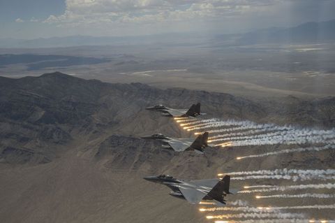three us air force f 15e strike eagles, assigned to the 391st fighter squadron from mountain home air force base, idaho, fire flares over the utah test and training range july 3, 2018 the f 15e strike eagle is a dual role fighter designed to perform air to air and air to ground missionsus air force photo by airman 1st class codie trimble