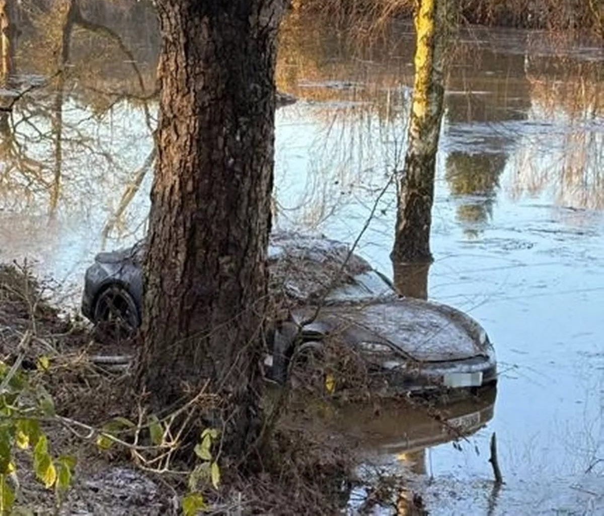 Frozen Porsche Taycan Discovered Washed Up on Golf Course After Flood