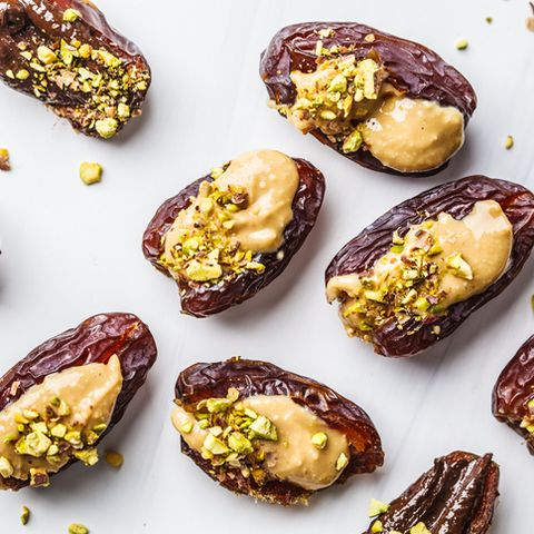 dates stuffed with peanut butter and pistachios, a healthy sweet snack